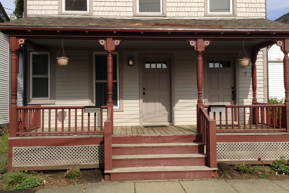 Photo of a customer's front porch before new spindles from Mr. Spindle